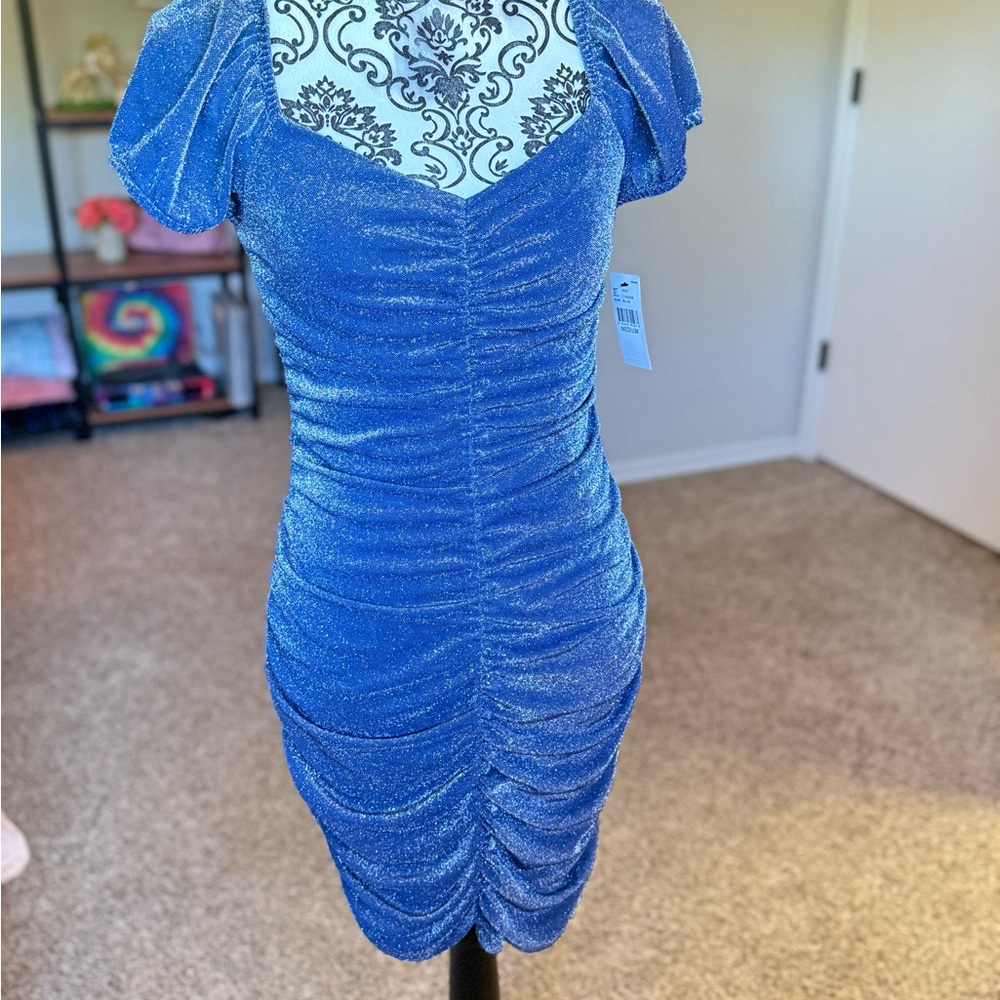 Blue, sparkly, ribbed dress.